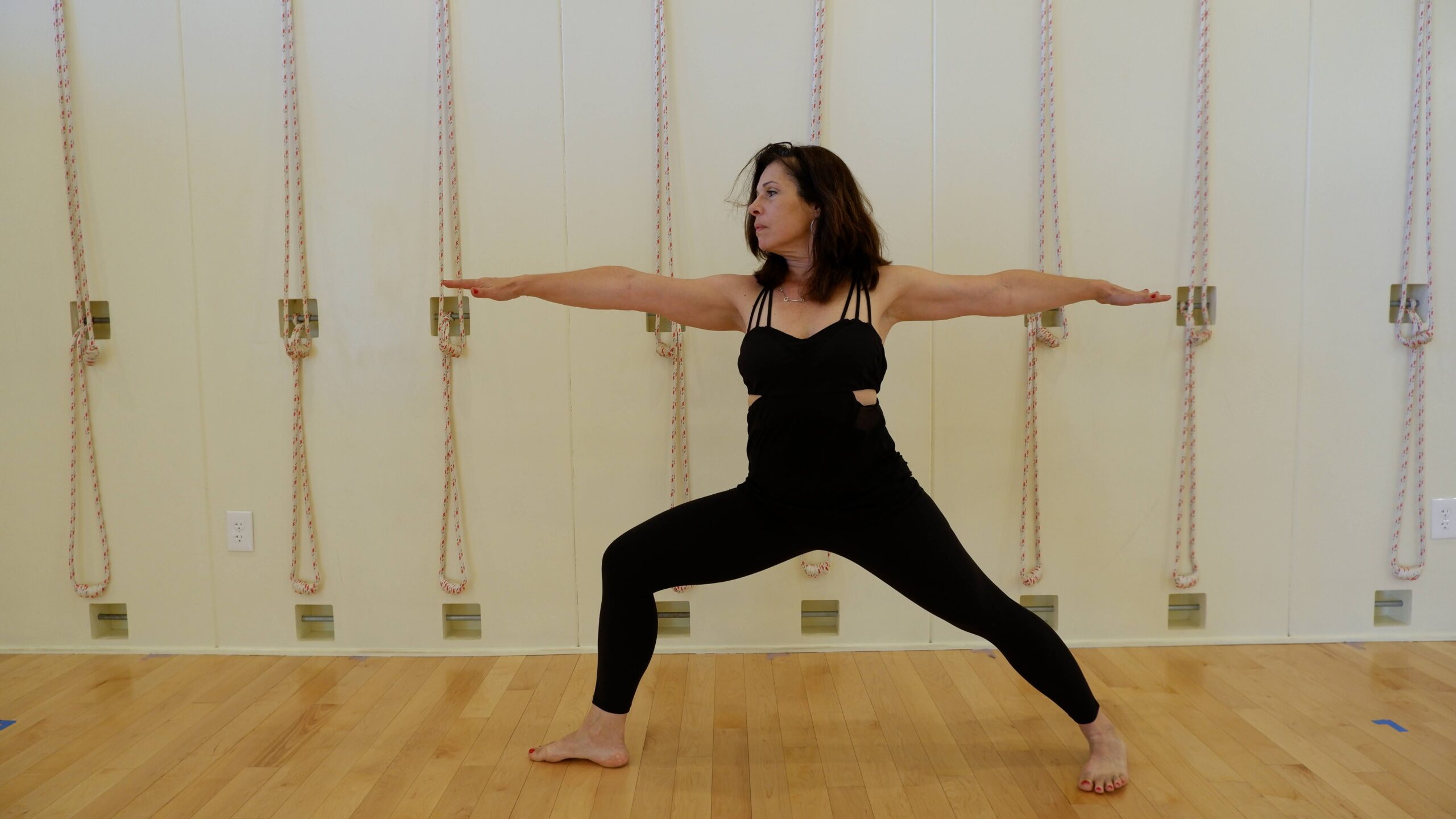 woman in warrior 2 pose